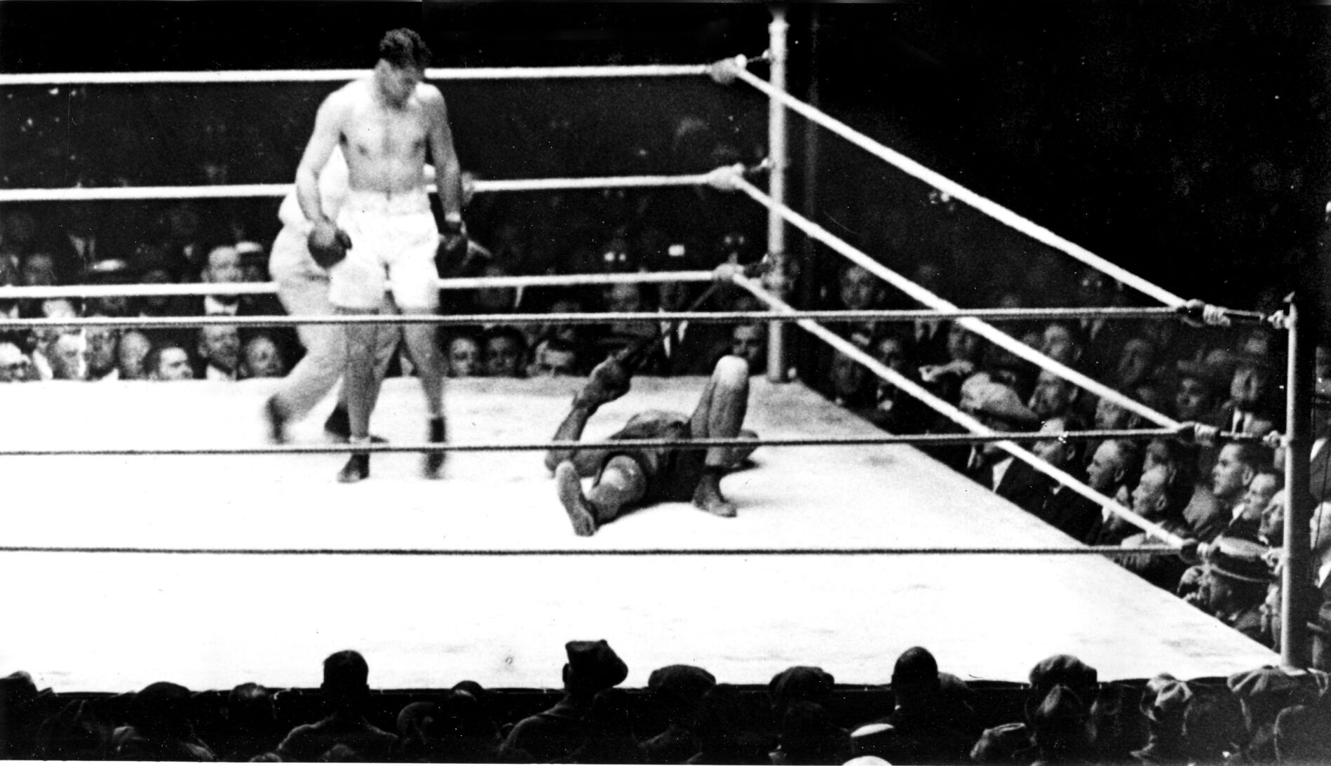 1923: Jack Dempsey knocks out Luis Firpo in his last successful title defense